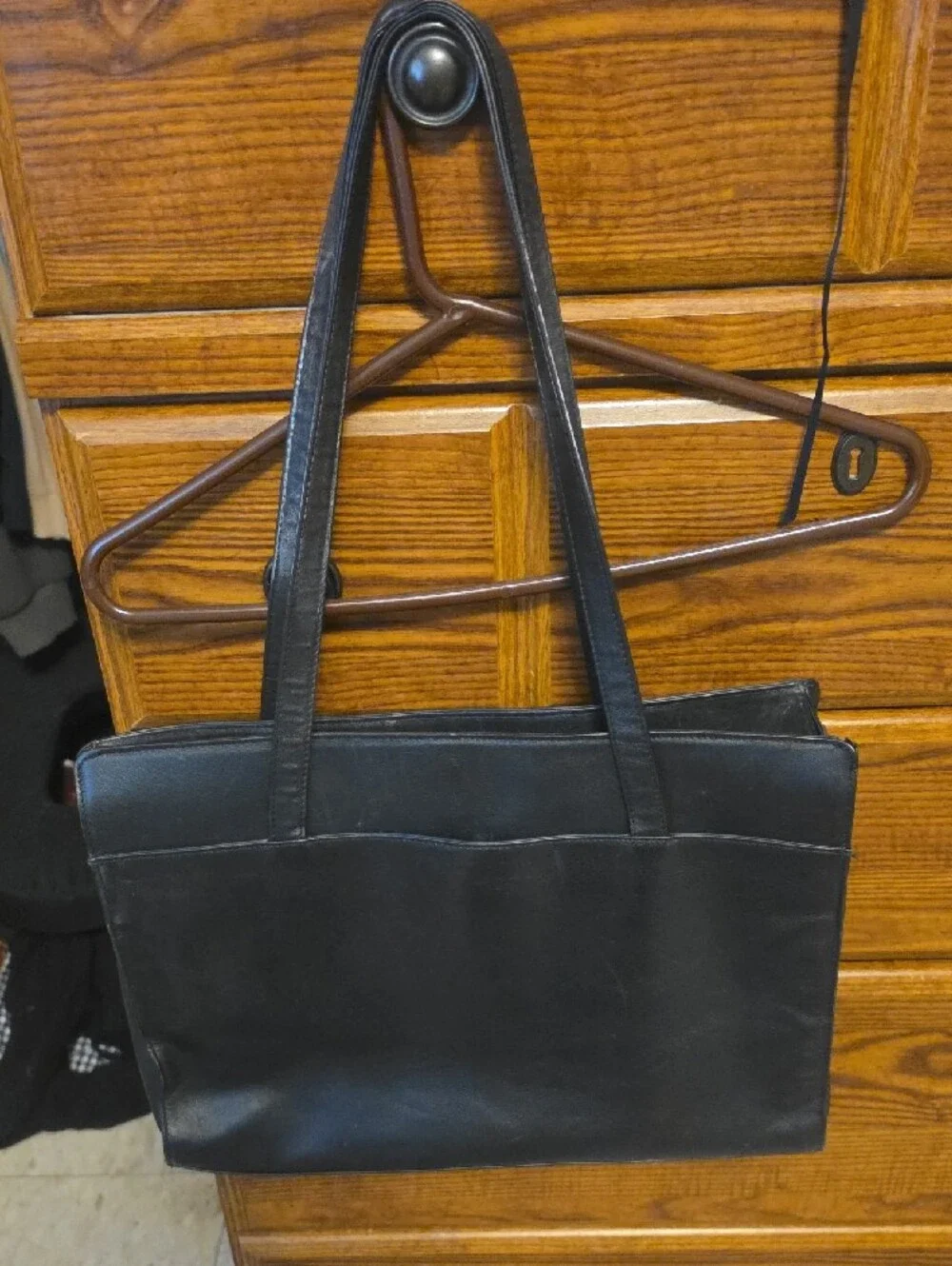 Black Leather Women's Shoulder Bag with Gold Emblem